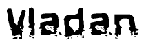 This nametag says Vladan, and has a static looking effect at the bottom of the words. The words are in a stylized font.