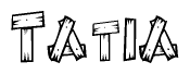 The image contains the name Tatia written in a decorative, stylized font with a hand-drawn appearance. The lines are made up of what appears to be planks of wood, which are nailed together