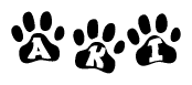 The image shows a row of animal paw prints, each containing a letter. The letters spell out the word Aki within the paw prints.