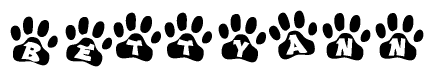 The image shows a series of animal paw prints arranged horizontally. Within each paw print, there's a letter; together they spell Bettyann