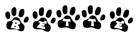 The image shows a series of animal paw prints arranged horizontally. Within each paw print, there's a letter; together they spell Bette