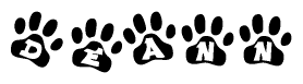 The image shows a series of animal paw prints arranged in a horizontal line. Each paw print contains a letter, and together they spell out the word Deann.