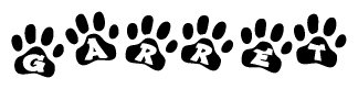 The image shows a series of animal paw prints arranged in a horizontal line. Each paw print contains a letter, and together they spell out the word Garret.