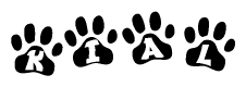 The image shows a row of animal paw prints, each containing a letter. The letters spell out the word Kial within the paw prints.
