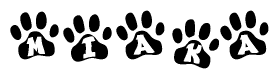 The image shows a series of animal paw prints arranged in a horizontal line. Each paw print contains a letter, and together they spell out the word Miaka.