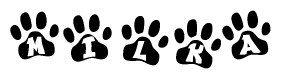 The image shows a series of animal paw prints arranged in a horizontal line. Each paw print contains a letter, and together they spell out the word Milka.