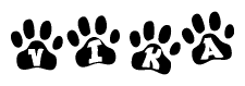 The image shows a series of animal paw prints arranged horizontally. Within each paw print, there's a letter; together they spell Vika