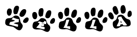 The image shows a row of animal paw prints, each containing a letter. The letters spell out the word Zella within the paw prints.