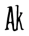 The image contains the word 'Ak' written in a cursive, stylized font.