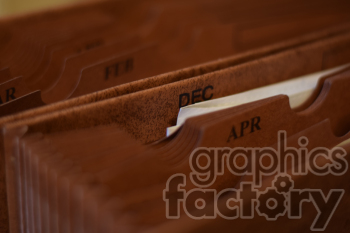 This photo shows card divider sheets for a file manager. You can see 'Feb', 'Dec' and 'Apr'