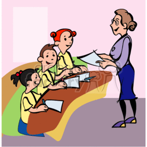 This clipart image shows a classroom setting with a teacher and three students. The teacher is standing to the right, holding papers and engaging with the students. The students are sitting at a curved table, looking happy and smiling, with one of them writing in a notebook, showcasing a sense of learning and determination. They appear to be focused on their assignment or homework.