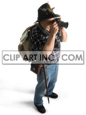 A person dressed as a hiker, wearing a hat and backpack, is taking a photo with a camera.