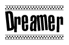 The image contains the text Dreamer in a bold, stylized font, with a checkered flag pattern bordering the top and bottom of the text.