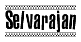 The image contains the text Selvarajan in a bold, stylized font, with a checkered flag pattern bordering the top and bottom of the text.