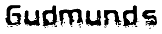 The image contains the word Gudmunds in a stylized font with a static looking effect at the bottom of the words