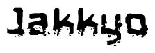 This nametag says Jakkyo, and has a static looking effect at the bottom of the words. The words are in a stylized font.