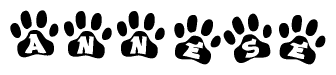 The image shows a row of animal paw prints, each containing a letter. The letters spell out the word Annese within the paw prints.