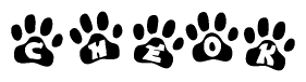 The image shows a series of animal paw prints arranged in a horizontal line. Each paw print contains a letter, and together they spell out the word Cheok.