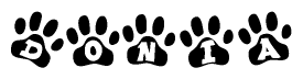 The image shows a series of animal paw prints arranged horizontally. Within each paw print, there's a letter; together they spell Donia