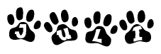 The image shows a row of animal paw prints, each containing a letter. The letters spell out the word Juli within the paw prints.
