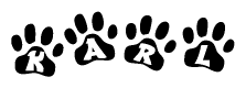 The image shows a series of animal paw prints arranged horizontally. Within each paw print, there's a letter; together they spell Karl