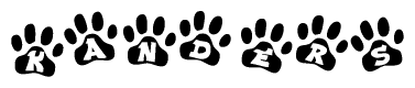 The image shows a series of animal paw prints arranged horizontally. Within each paw print, there's a letter; together they spell Kanders