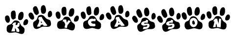 The image shows a row of animal paw prints, each containing a letter. The letters spell out the word Kaycasson within the paw prints.