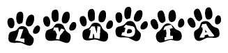 The image shows a row of animal paw prints, each containing a letter. The letters spell out the word Lyndia within the paw prints.