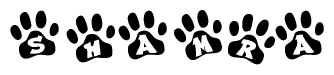 The image shows a series of animal paw prints arranged horizontally. Within each paw print, there's a letter; together they spell Shamra