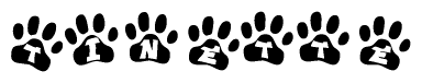 The image shows a series of animal paw prints arranged in a horizontal line. Each paw print contains a letter, and together they spell out the word Tinette.