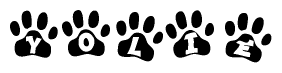 The image shows a row of animal paw prints, each containing a letter. The letters spell out the word Yolie within the paw prints.