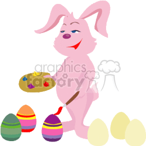   The clipart image depicts a pink Easter bunny with blue eyes, standing while holding a paintbrush and a palette with various colors. The bunny seems to be in the process of decorating Easter eggs, with several painted eggs in bright colors visible in front of it, and some unpainted eggs to its side. The expression on the bunny