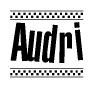 The clipart image displays the text Audri in a bold, stylized font. It is enclosed in a rectangular border with a checkerboard pattern running below and above the text, similar to a finish line in racing. 