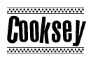 The image is a black and white clipart of the text Cooksey in a bold, italicized font. The text is bordered by a dotted line on the top and bottom, and there are checkered flags positioned at both ends of the text, usually associated with racing or finishing lines.