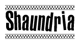 The clipart image displays the text Shaundria in a bold, stylized font. It is enclosed in a rectangular border with a checkerboard pattern running below and above the text, similar to a finish line in racing. 