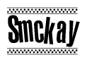 The image is a black and white clipart of the text Smckay in a bold, italicized font. The text is bordered by a dotted line on the top and bottom, and there are checkered flags positioned at both ends of the text, usually associated with racing or finishing lines.
