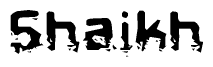 This nametag says Shaikh, and has a static looking effect at the bottom of the words. The words are in a stylized font.