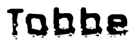   The image contains the word Tobbe in a stylized font with a static looking effect at the bottom of the words 