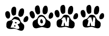The image shows a series of animal paw prints arranged in a horizontal line. Each paw print contains a letter, and together they spell out the word Bonn.