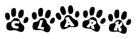 The image shows a series of animal paw prints arranged in a horizontal line. Each paw print contains a letter, and together they spell out the word Clark.