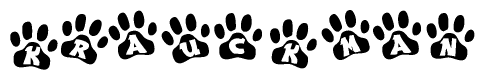 The image shows a series of animal paw prints arranged in a horizontal line. Each paw print contains a letter, and together they spell out the word Krauckman.
