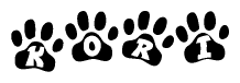 The image shows a row of animal paw prints, each containing a letter. The letters spell out the word Kori within the paw prints.
