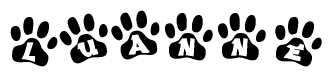 The image shows a series of animal paw prints arranged horizontally. Within each paw print, there's a letter; together they spell Luanne