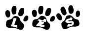 The image shows a series of animal paw prints arranged in a horizontal line. Each paw print contains a letter, and together they spell out the word Les.