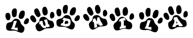 The image shows a series of animal paw prints arranged in a horizontal line. Each paw print contains a letter, and together they spell out the word Ludmila.