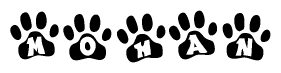 The image shows a series of animal paw prints arranged in a horizontal line. Each paw print contains a letter, and together they spell out the word Mohan.