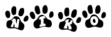 The image shows a row of animal paw prints, each containing a letter. The letters spell out the word Niko within the paw prints.