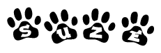 The image shows a row of animal paw prints, each containing a letter. The letters spell out the word Suze within the paw prints.