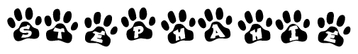 The image shows a series of animal paw prints arranged in a horizontal line. Each paw print contains a letter, and together they spell out the word Stephahie.