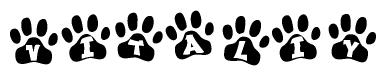 The image shows a row of animal paw prints, each containing a letter. The letters spell out the word Vitaliy within the paw prints.